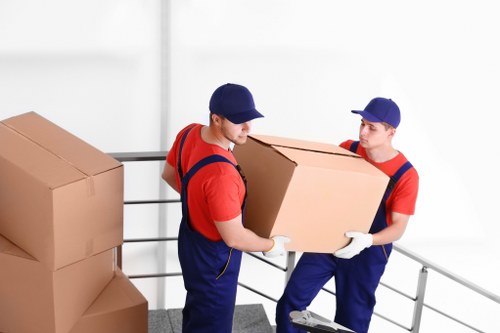 House removals team planning a move in Tooting street