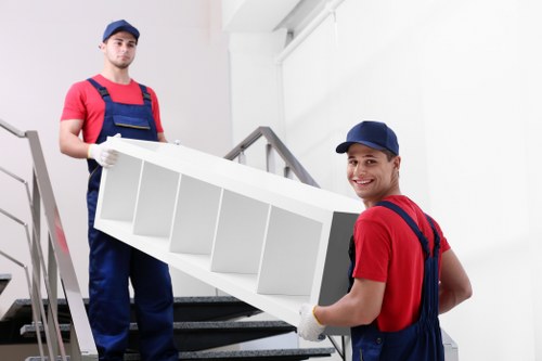 Professional movers handling furniture during a Tooting relocation