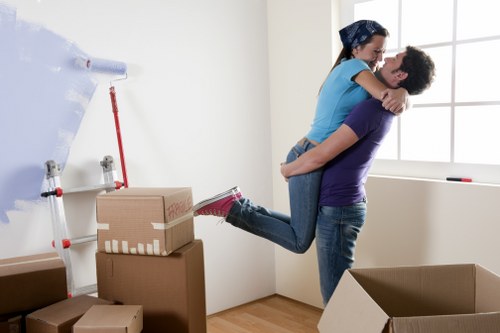 Mover wearing PPE while loading furniture