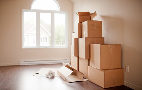 A local moving team preparing boxes for a Tooting house move