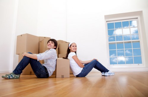 Moving team preparing items safely for loading