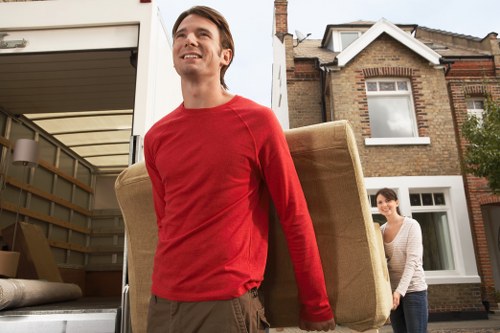 Large moving truck loaded with furniture and boxes