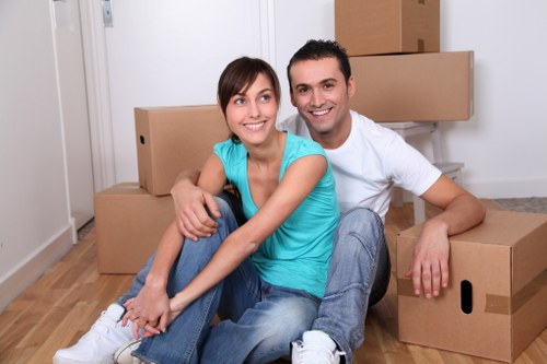 Packed moving boxes ready for a home relocation in Tooting