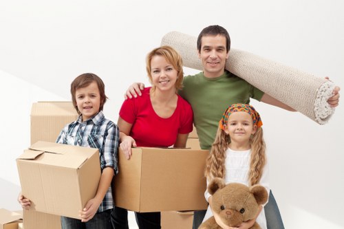 Packed moving boxes and furniture prepared for transport