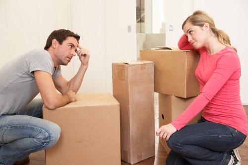 Local man and van moving items through a Tooting property