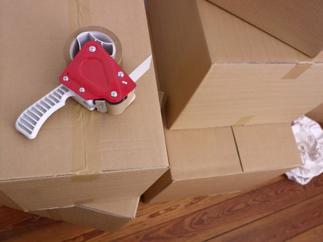 Home relocation setup with packed boxes in Tooting